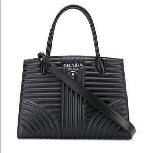 Prada black quilted leather tote.
